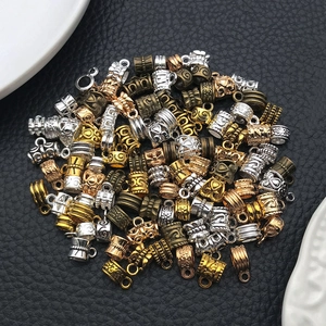 Assorted vintage alloy pendant charms and beads for DIY jewelry making in multiple finishes