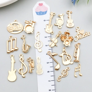 Pendentifs en alliage doré pour bracelets DIY avec motifs de guitare et notes de musique