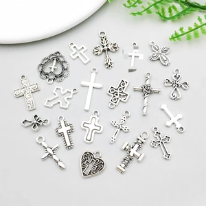 Antique silver cross pendant set in various hollow designs for DIY jewelry making