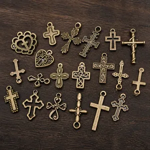Collection of antique bronze hollow cross charms for DIY jewelry making and crafts