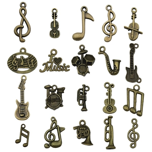 Set di ciondoli musicali in bronzo antico con chitarra, sassofono e note per gioielli DIY