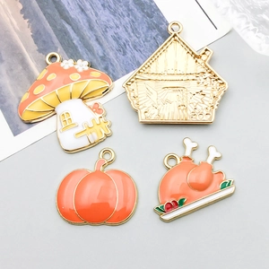 Detailed set of colorful enamel Thanksgiving charms including pumpkin and turkey pendants
