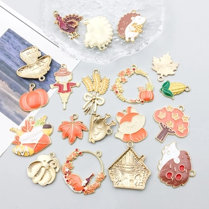 Colorful enamel Thanksgiving charms featuring turkey and pumpkin for DIY jewelry