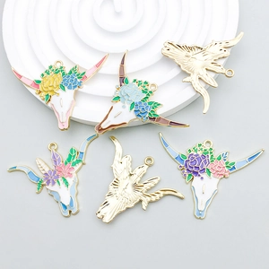 Bohemian enamel bull skull pendants with colorful floral details for DIY jewelry making