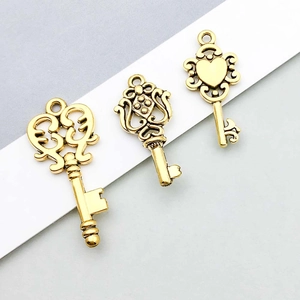 Three antique gold hollow heart key charms for DIY necklace and bracelet jewelry making