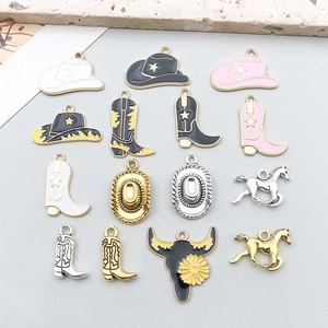 Flat lay of Western cowboy style alloy enamel charms including hats, boots, and horse heads