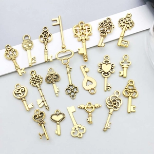 Set of 17 vintage style antique gold alloy hollow heart and key charms for DIY jewelry making
