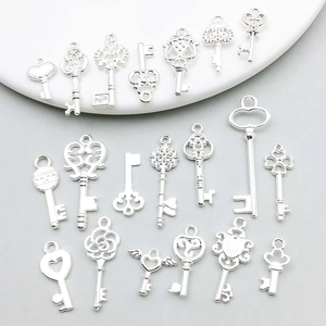 Ensemble de breloques clés vintage en argent avec motifs creux pour bijoux DIY
