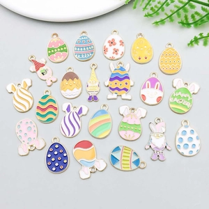 Detailed collection of Easter egg pendants and bunny charms with colorful enamel finish