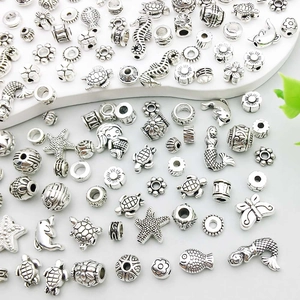 Antique silver sea animal spacer beads featuring turtles and seahorses for DIY jewelry making