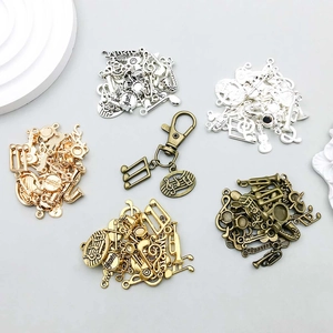 Détails des pendentifs instruments de musique en alliage avec diverses finitions métalliques