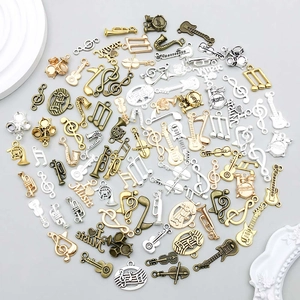Lot de breloques musicales en alliage avec guitares et notes pour bijoux DIY