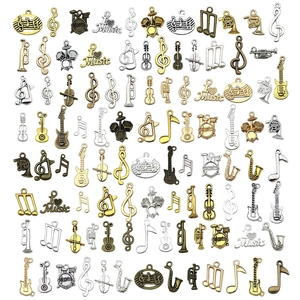 Assortiment de breloques vintage en alliage instruments de musique et notes de musique