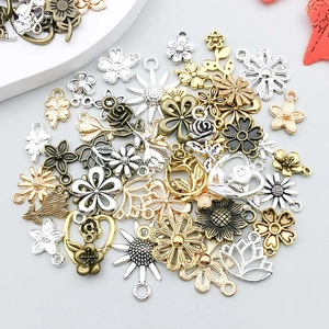 Mix of alloy floral charms like sunflowers and roses for DIY jewelry making