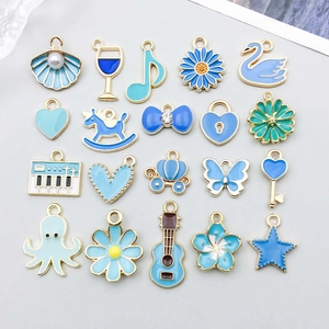 Ciondoli in Lega di Zinco Blu Lago Smalto Farfalla Cigno Cuore Fiore Strumenti Musicali Accessori per Gioielli DIY Donna