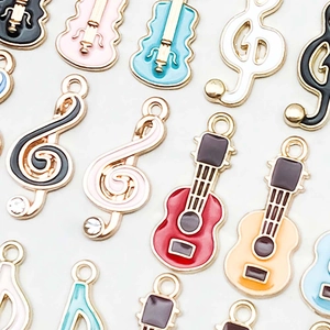 Detailed grid of colorful enamel music note and instrument pendants with gold alloy edges