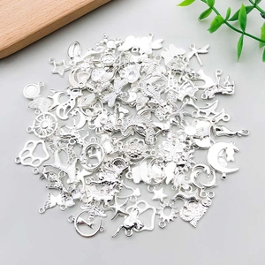 Detailed collection of bright silver alloy charms with animal and celestial shapes for DIY jewelry