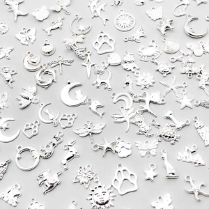 Detailed assortment of silver alloy butterfly and animal charms for DIY jewelry making
