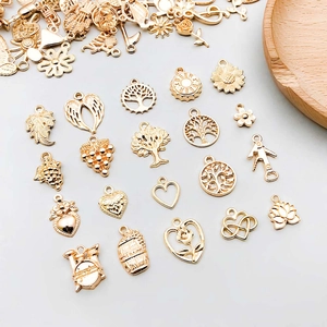 Assortiment de breloques dorées en alliage avec arbre de vie et fleurs pour bijoux DIY