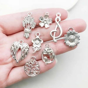 Silver alloy charms set featuring tree of life and flowers for DIY jewelry making
