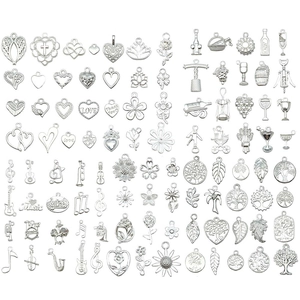 Variety of silver alloy charms including sunflowers and trees for DIY jewelry making