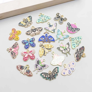 Colorful enamel butterfly pendants in various vibrant styles for DIY jewelry making