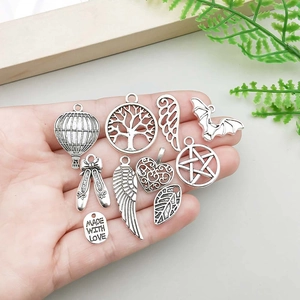 Antique silver alloy charms set featuring wings and hot air balloon for DIY jewelry