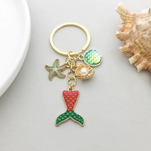 Porte-clés Thème Marin Queue de Sirène Étoile de Mer Coquillage Avec Fausse Künstliche Perle Alliage de Zinc Or Pendentif de Sac Femme