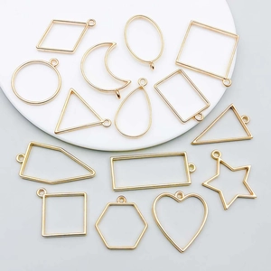 Set of 13 KC gold alloy geometric frames with loops for DIY resin jewelry making