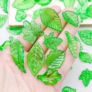 Green translucent acrylic leaf pendants in various shapes for DIY jewelry making and crafts