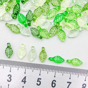 Green acrylic leaf pendants for jewelry making with size reference ruler