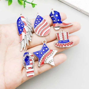 Set of 6 USA flag themed enamel pendants including star and cowboy boot on hand