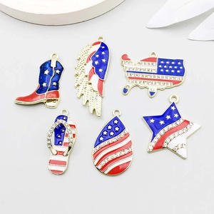 Detailed close-up of 6 USA flag theme enamel charms with rhinestones for DIY jewelry