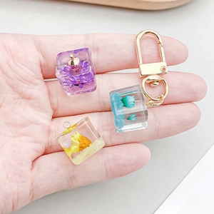 Handmade luminous resin flower cube pendants with dry flowers and gold lobster clasp charms