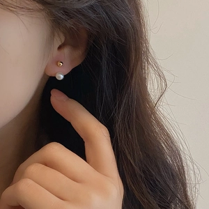 Minimalist S925 silver needle pearl stud earrings featuring a gold metal bead design