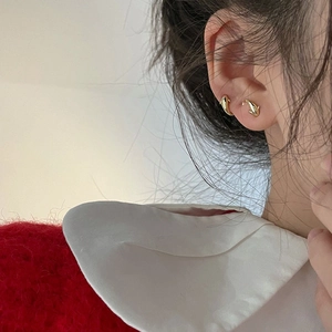 Elegant 3D golden dolphin stud earrings for women with high-polished metal finish