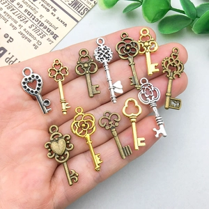 Vintage alloy key charms in bronze, gold and silver for DIY jewelry and crafts