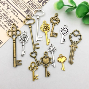Assorted vintage alloy key pendants in bronze, silver, and gold for DIY jewelry making