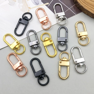 Close-up of swivel lobster clasps in gold silver rose gold black and gunmetal finishes