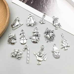 Set of 13 antique silver Christmas alloy charms including Santa and snowman for DIY jewelry