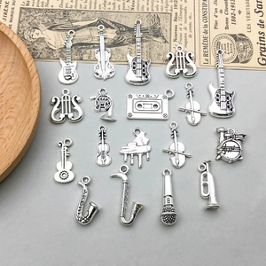 Vintage silver musical instrument charm set including guitar and violin for DIY jewelry