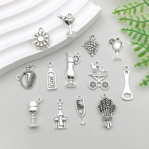 Detailed collection of vintage silver wine-themed metal charms for DIY jewelry making