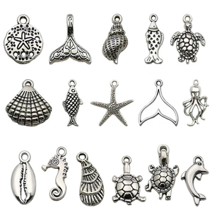 Antique silver sea creature charms including seahorse and dolphin for DIY jewelry making