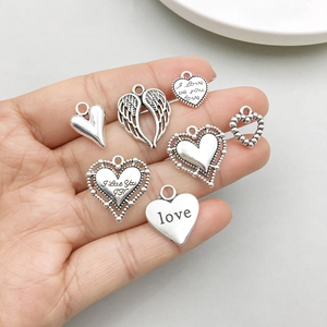 Lot de 7 breloques coeur et aile d'ange en argent antique pour création de bijoux