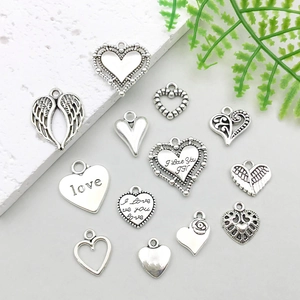 Pendentifs en alliage argent antique cœur et aile pour accessoires de bijoux DIY