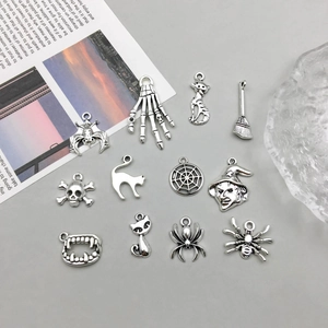 Set of 12 antique silver Halloween charms featuring skull, spider and bat for DIY jewelry