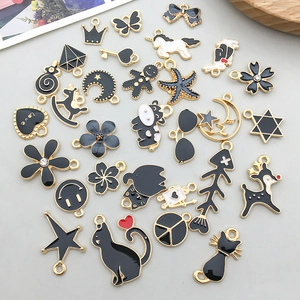 Assorted black enamel animal and flower charms for DIY jewelry making accessories