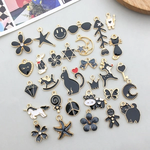 Mix of 30 black enamel gold-plated DIY animal and symbol charms for jewelry making