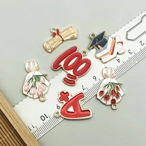 Cute enamel graduation charms set featuring graduate scrolls and caps for DIY jewelry