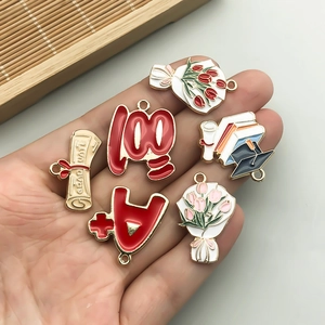 Cartoon enamel graduation charms set for DIY bracelets featuring a floral diploma and cap